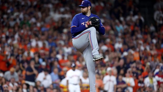 Oct 15, 2023; Houston, Texas, USA; Texas Rangers pitcher Jordan Montgomery (52) throws during the first inning of game one of the ALCS against the Houston Astros in the 2023 MLB playoffs at Minute Maid Park.