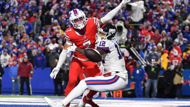 Oct 15, 2023; Orchard Park, New York, USA; Buffalo Bills cornerback Taron Johnson (7) breaks up a pass in the endzone to New York Giants tight end Darren Waller (12) on th last play of the game at Highmark Stadium. Mandatory Credit: Mark Konezny-USA TODAY Sports  