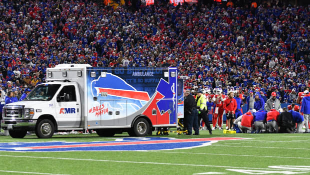 An ambulance arrives on the field for Bills running back Damien Harris.