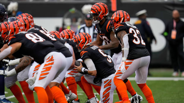 Cincinnati Bengals quarterback Joe Burrow (9) takes a knee to end the fourth quarter of the NFL Week 6 game between the Cincinnati Bengals and the Seattle Seahawks at Paycor Stadium in downtown Cincinnati on Sunday, Oct. 15, 2023. The Bengals improved to 3-3 on the season with a 17-13 at home.  