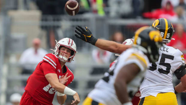 Wisconsin quarterback Braedyn Locke (18) passes the ball against Iowa on Saturday, October 14, 2023, at Camp Randall Stadium in Madison, Wis. Iowa won the game, 12-6.