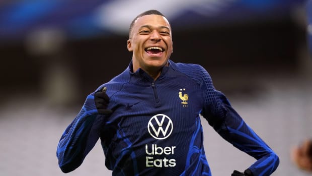 Kylian Mbappe pictured smiling during a training session with the France national team in October 2023