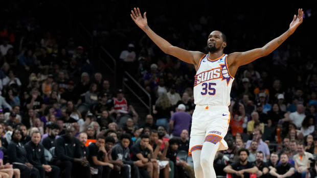 Phoenix Suns forward Kevin Durant (35) reacts after scoring against the Portland Trail Blazers in the first half at Footprint Center.