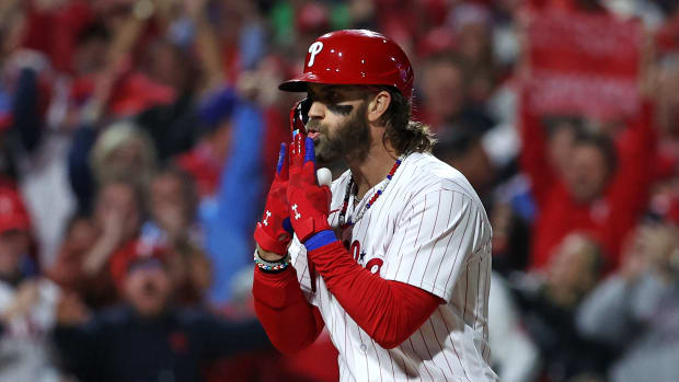Oct 16, 2023; Philadelphia, Pennsylvania, USA; Philadelphia Phillies first baseman Bryce Harper (3) hits a solo home run during the first inning against the Arizona Diamondbacks in game one of the NLCS for the 2023 MLB playoffs at Citizens Bank Park. Mandatory Credit: Bill Streicher-USA TODAY Sports