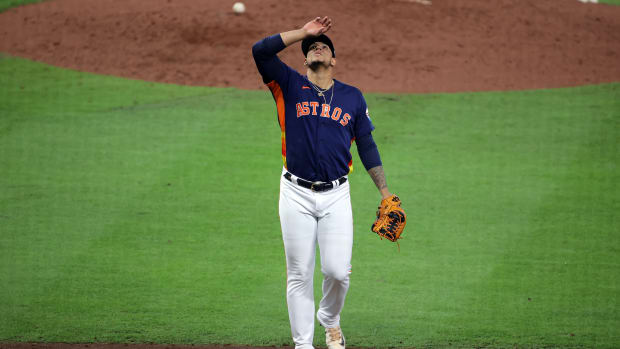 Oct 16, 2023; Houston, Texas, USA; Houston Astros relief pitcher Bryan Abreu (52) reacts in the eighth inning against the Texas Rangers during game two of the ALCS for the 2023 MLB playoffs at Minute Maid Park.