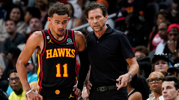Hawks point guard Trae Young speaks with Hawks point guard Trae Young.