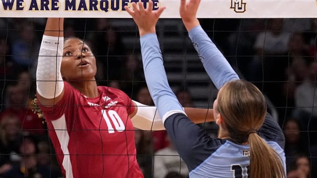 Wisconsin middle blocker Devyn Robinson (10) hits a shot during their volleyball match against Marquette Wednesday, September 13, 2023 at Fiserv Forum in Milwaukee, Wis. Official attendance was 17,037 making it the largest indoor regular-season crowd for a volleyball match in NCAA history and the largest crowd to see a women s sporting event in Wisconsin history.
