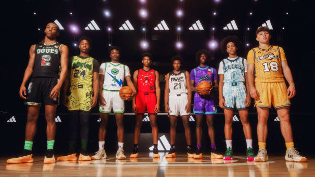 Overtime Elite players pose with the new Adidas team uniforms.