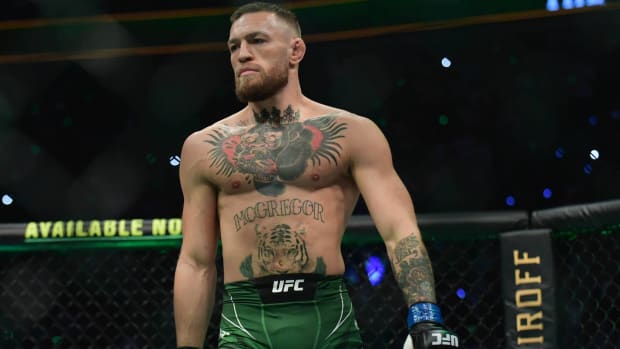 UFC fighter Conor McGregor looks on during a fight.