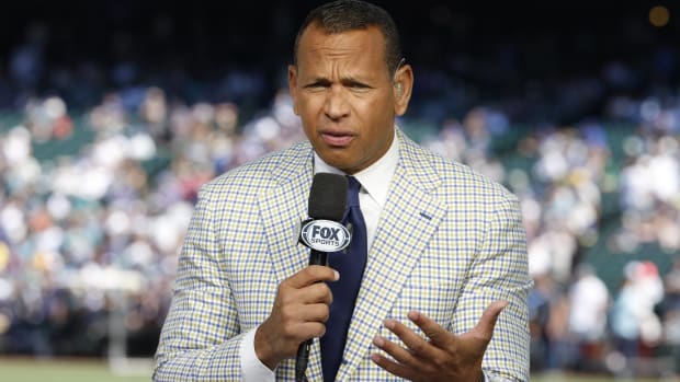Fox Sports analyst Alex Rodriguez speaks on a broadcast before a game.