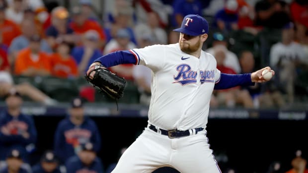 Oct 20, 2023; Arlington, Texas, USA; Texas Rangers pitcher Jordan Montgomery (52) throws during the third inning of game five in the ALCS against the Houston Astros for the 2023 MLB playoffs at Globe Life Field. Mandatory Credit: Kevin Jairaj-USA TODAY Sports