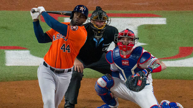 Astros’ Yordan Alvarez drives in a run vs. the Rangers in ALCS Game 4.
