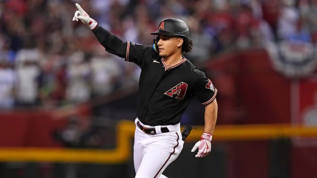 Arizona Diamondbacks outfielder Alek Thomas rounds the bases after hitting a game-tying home run against the Philadelphia Phillies on Oct. 20, 2023, in Phoenix.