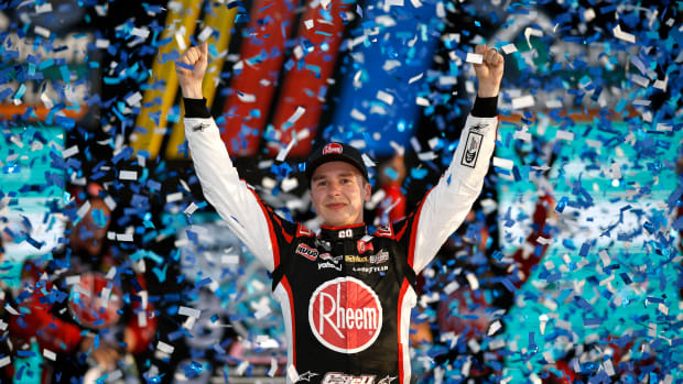 Christopher Bell celebrates in victory lane after winning Sunday's NASCAR Cup Series 4EVER 400 Presented by Mobil 1 at Homestead-Miami Speedway. (Photo by James Gilbert/Getty Images)