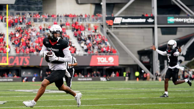 Cincinnati Bearcats wide receiver Evan Prater (3) scores on a two-point conversion from Cincinnati Bearcats quarterback Emory Jones (5) background, in the fourth quarter during a college football game between the Baylor Bears and the Cincinnati Bearcats, Saturday, Oct. 21, 2023, at Nippert Stadium in Cincinnati.