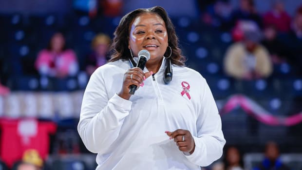 Georgia Tech associate head coach Tasha Butts discusses her own battle with breast cancer during a game against Pitt.