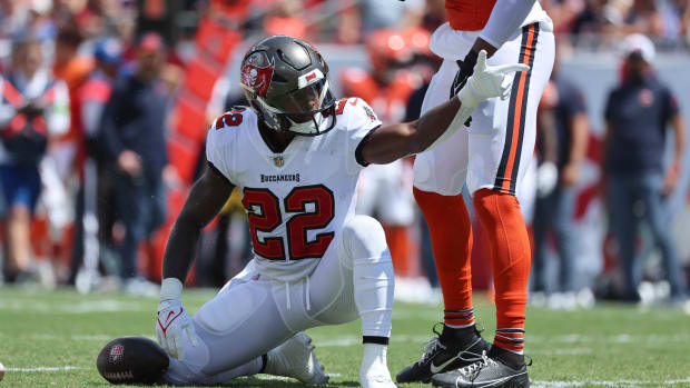 Sep 17, 2023; Tampa, Florida, USA; Tampa Bay Buccaneers running back Chase Edmonds (22) reacts as he gets a first down against the Chicago Bears during the first quarter at Raymond James Stadium. Mandatory Credit: Kim Klement Neitzel-USA TODAY Sports