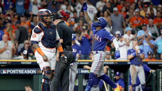 Oct 23, 2023; Houston, Texas, USA; Texas Rangers right fielder Adolis Garcia (53) reacts after hitting a home run during the third inning of game seven in the ALCS against the Houston Astros for the 2023 MLB playoffs at Minute Maid Park. Mandatory Credit: Thomas Shea-USA TODAY Sports