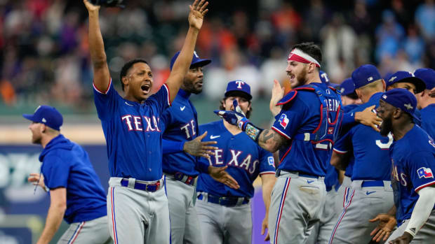 The Texas Rangers celebrate after Game 7 of the baseball AL Championship Series against the Houston Astros Monday, Oct. 23, 2023, in Houston. The Rangers won 11-4 to win the series 4-3. (AP Photo/Godofredo A. Vásquez)   