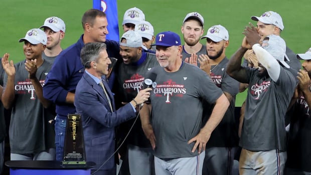 Texas Rangers manager Bruce Bochy is interviewed after winning Game 7 in the ALCS against the Houston Astros on Oct. 23 at Minute Maid Park.