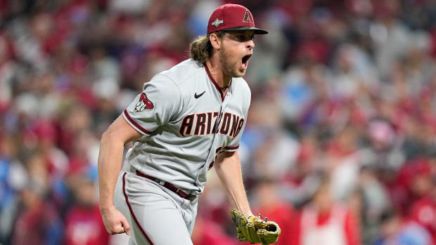 Diamondbacks relief pitcher Kevin Ginkel celebrates after the last out in the ninth inning in Game 7 of the NLCS against the Phillies.