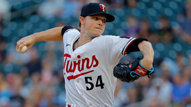 Aug 25, 2023; Minneapolis, Minnesota, USA; Minnesota Twins starting pitcher Sonny Gray (54) throws to the Texas Rangers in the first inning at Target Field. Mandatory Credit: Bruce Kluckhohn-USA TODAY Sports