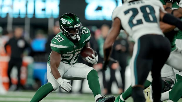 Oct 15, 2023; East Rutherford, New Jersey, USA; New York Jets running back Breece Hall (20) runs with the ball against the Philadelphia Eagles during the third quarter at MetLife Stadium.
