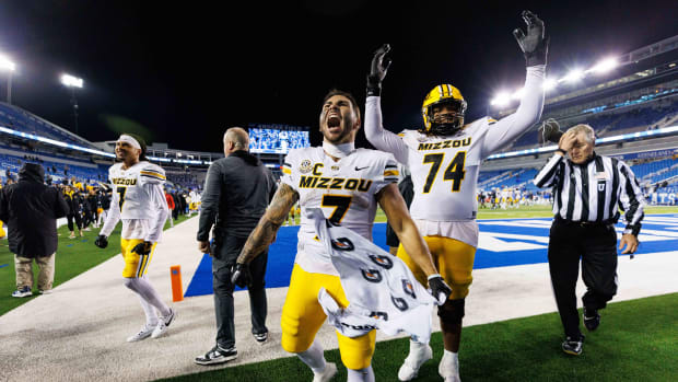 Oct 14, 2023; Lexington, Kentucky, USA; Missouri Tigers running back Cody Schrader (7) and offensive lineman Cam'Ron Johnson (74) celebrate after the game against the Kentucky Wildcats at Kroger Field. Mandatory Credit: Jordan Prather-USA TODAY Sports