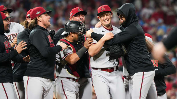 Diamondbacks players celebrate winning Game 7 of the NLCS over the Phillies.