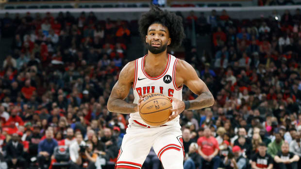 Chicago Bulls guard Coby White looks to pass