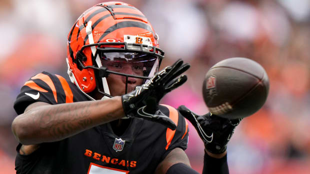 Cincinnati Bengals wide receiver Tee Higgins (5) catches a pass in the third quarter during an NFL football game between the Seattle Seahawks and the Cincinnati Bengals Sunday, Oct. 15, 2023, at Paycor Stadium in Cincinnati.