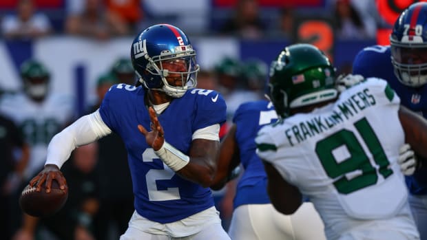 Giants' QB Tyrod Taylor (2) winds up to throw against the Jets
