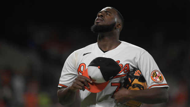 Aug 22, 2023; Baltimore, Maryland, USA; Baltimore Orioles relief pitcher Felix Bautista (74) walks off the field after pitching the ninth inning against the Toronto Blue Jays at Oriole Park at Camden Yards. Mandatory Credit: Tommy Gilligan-USA TODAY Sports