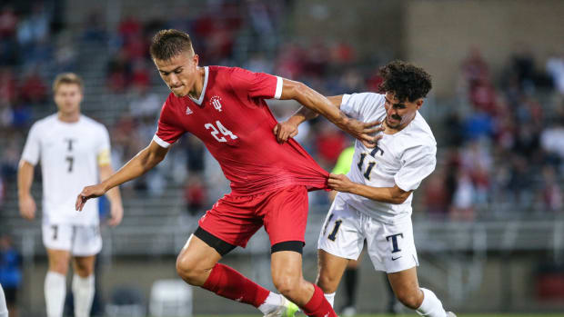 Oct. 27, 2023. Indiana redshirt senior Andrew Goldsworthy (24) dribbles with the ball against Trine. The Hoosiers won 2-0 at Bill Armstrong Stadium.