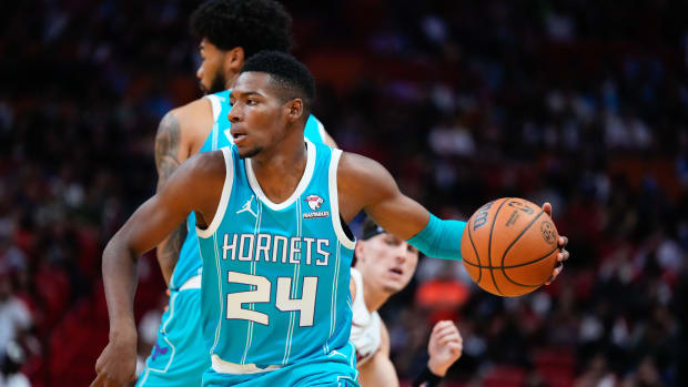 Oct 10, 2023; Miami, Florida, USA; Charlotte Hornets forward Brandon Miller (24) dribbles the ball against the Miami Heat during the second quarter at Kaseya Center. Mandatory Credit: Rich Storry-USA TODAY Sports