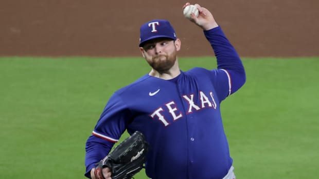 Rangers pitcher Jordan Montgomery (52) throws a pitch during the fifth inning of Game 7 of the ALCS against the Astros.