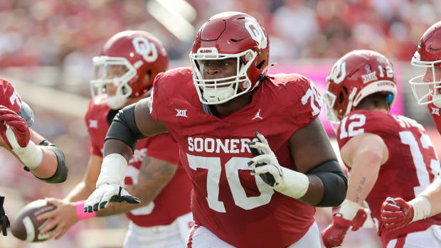 Oklahoma's Cayden Green (70) prepares to block in the first half of the college football game between the University of Oklahoma Sooners and the University of Central Florida Knights at Gaylord Family Oklahoma-Memorial Stadium in Norman, Okla., Saturday, Oct., 21, 2023.  