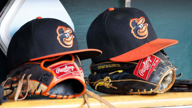 Apr 27, 2023; Detroit, Michigan, USA; Baltimore Orioles hats and glove sits in dugout in the second inning against the Detroit Tigers at Comerica Park. Mandatory Credit: Rick Osentoski-USA TODAY Sports