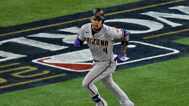 Diamondbacks second baseman Ketel Marte singles in two runs during Game 2 of the World Series against the Rangers on Oct. 28, 2023.