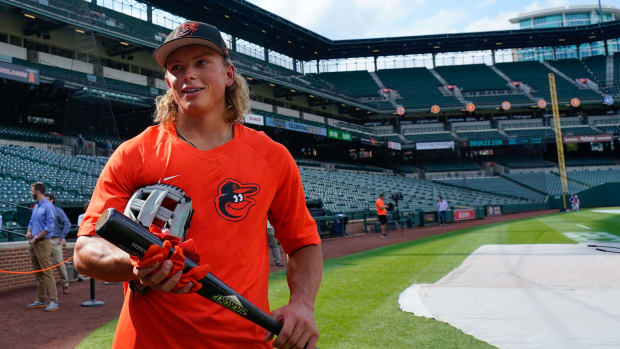Jul 27, 2022; Baltimore, Maryland, USA; Baltimore Orioles number one draft pick Jackson Holliday stands on the field during the batting practice before the game against the Tampa Bay Rays at Oriole Park at Camden Yards. Holliday was the number one over draft pick in the 2022 MLB Draft. Mandatory Credit: Tommy Gilligan-USA TODAY Sports