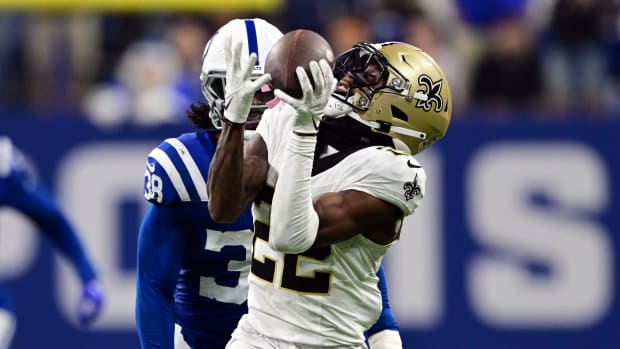 Oct 29, 2023; Indianapolis, Indiana, USA; New Orleans Saints wide receiver Rashid Shaheed (22) catches a long pass in front of Indianapolis Colts cornerback Tony Brown (38) during the second half at Lucas Oil Stadium.