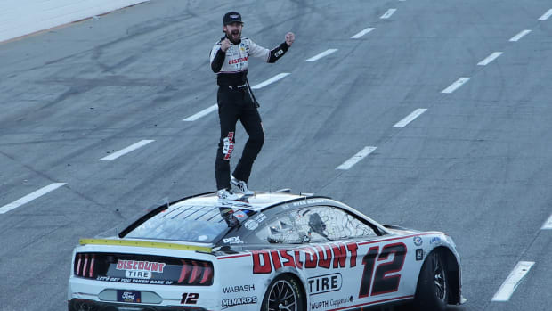 Now that's how you do it! Ryan Blaney celebrates in front of the sellout crowd Sunday at Martinsville Speedway. (Photo by Jonathan Bachman/Getty Images)