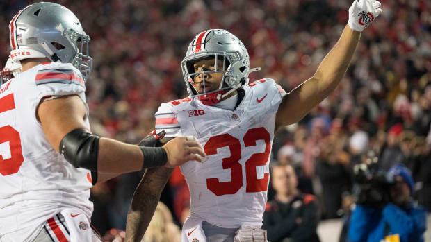 Oct 28, 2023; Madison, Wisconsin, USA; Ohio State Buckeyes running back TreVeyon Henderson (32) celebrates after scoring a touchdown during the fourth quarter against the Wisconsin Badgers at Camp Randall Stadium.