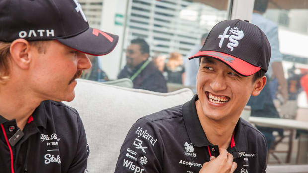 ALfa Romeo driver Zhou Guanyu smiles at the Mexican Grand Prix.