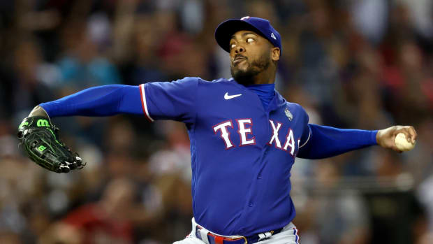 Texas Rangers pitcher Aroldis Chapman allowed a run in an inning of relief in the team's 3-1 Game 3 win Monday at Chase Field in Phoenix. The Rangers took a 2-1 lead in the best-of-seven World Series with the win.