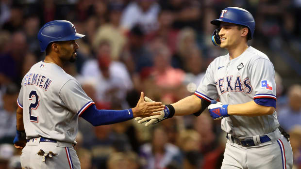 Marcus Semien and Corey Seager celebrate the Rangers’ early lead in World Series Game 4 vs. the Diamondbacks