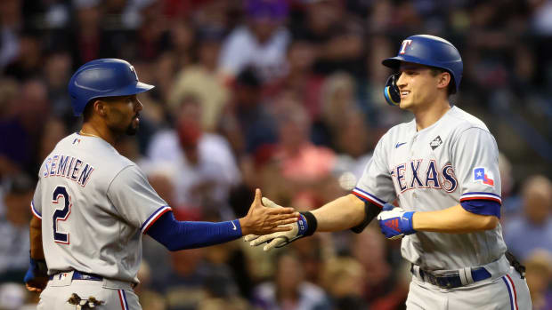 Oct 31, 2023; Phoenix, Arizona, USA; Texas Rangers shortstop Corey Seager (5) reacts after hitting a two run home run against the Arizona Diamondbacks during the second inning in game four of the 2023 World Series at Chase Field. Mandatory Credit: Mark J. Rebilas-USA TODAY Sports
