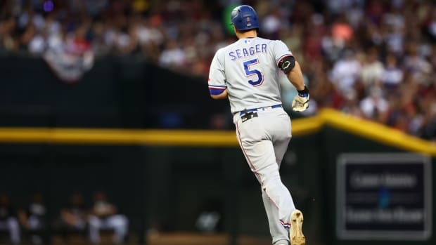 Oct 31, 2023; Phoenix, Arizona, USA; Texas Rangers shortstop Corey Seager (5) rounds the bases after hitting a two run home run against the Arizona Diamondbacks during the second inning in game four of the 2023 World Series at Chase Field. Mandatory Credit: Mark J. Rebilas-USA TODAY Sports