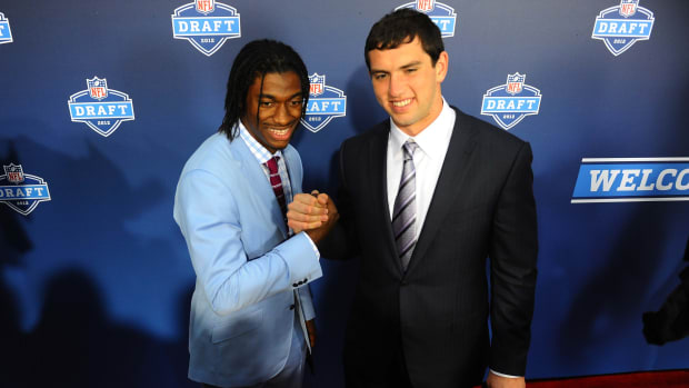 Apr 26, 2012; New York, NY, USA; Stanford quarterback Andrew Luck (right) and Baylor quarterback Robert Griffin III (left) pose for a photo on the red carpet before the start of the 2012 NFL Draft at Radio City Music Hall. Mandatory Credit: James Lang-USA TODAY Sports