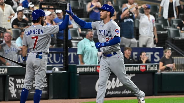 Jul 26, 2023; Chicago, Illinois, USA; Chicago Cubs center fielder Cody Bellinger (24) high fives Chicago Cubs shortstop Dansby Swanson (7) after hitting a home run against the Chicago White Sox during the eighth inning at Guaranteed Rate Field. Mandatory Credit: Matt Marton-USA TODAY Sports